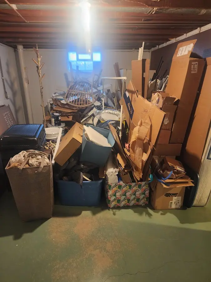 Roll-off dumpster container at job site for 2 Yard Dumpster Rental in Byram